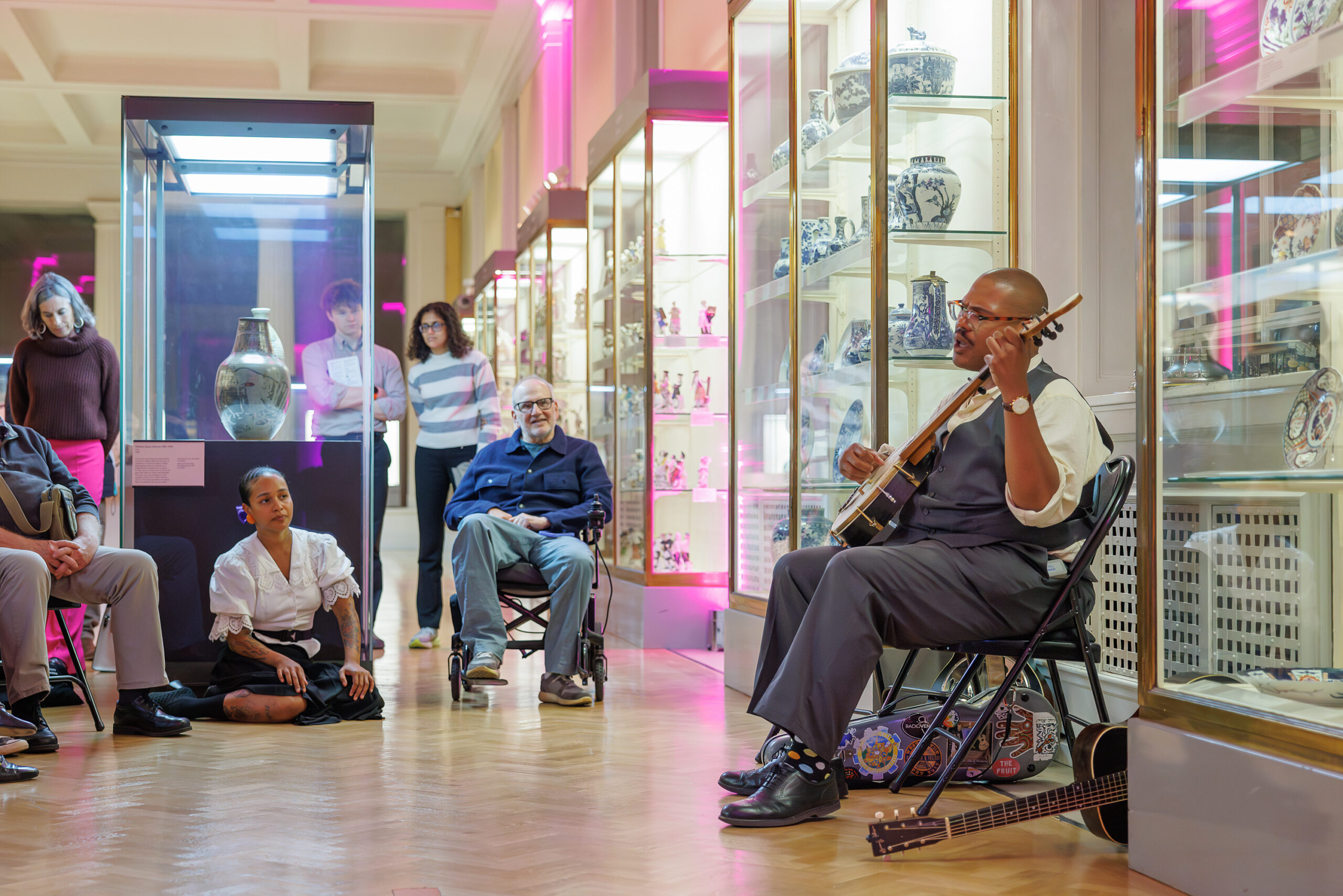 Folk musician Jerron Paxton playing the banjo